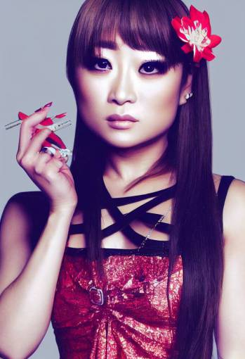Ayumi Hamasaki with pop star face makeup, minidress