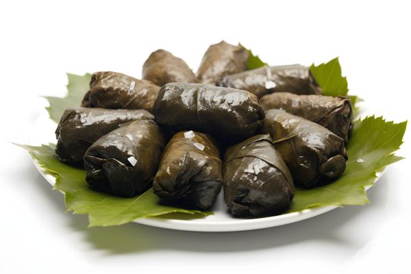 A platter of Greek-style dolmades with tzatziki sauce, close-up, white background, realism, hd, 35mm photograph, sharp, sharpened, 8k