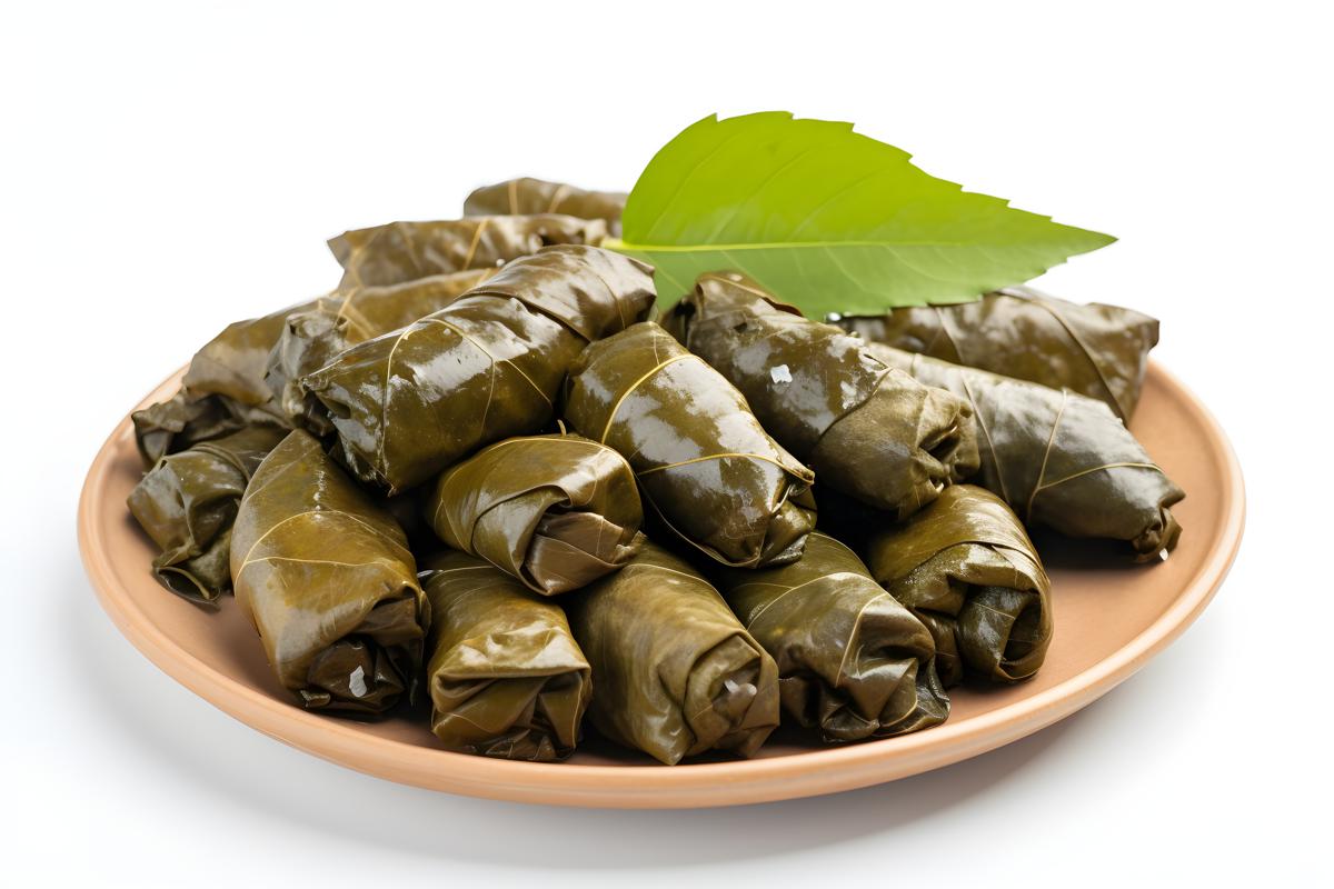 A platter of Greek-style dolmades with tzatziki sauce, close-up, white background, realism, hd, 35mm photograph, sharp, sharpened, 8k picture